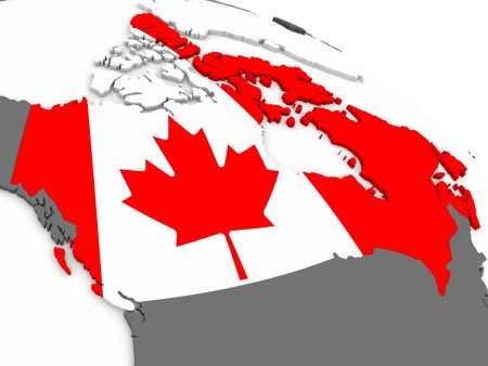 Canadian flag overlaying a map of the country.