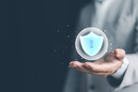 EBA issues draft risk and business continuity guidelines for issuers of asset referenced tokens concept showing crypto governance - a hand holds a secure sphere.
