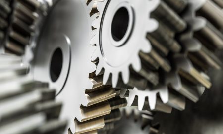 A group of inter-linked cogs depicts an operational resilience exercise with suppliers involved.