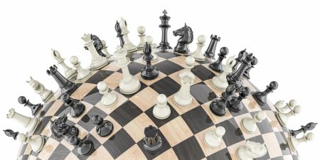 UK CFOs see geopolitical risk as the top threat: and one that is set to increase Chess pieces on a globe show the idea of geopolitical risks