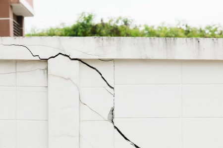 Urban subsidence is increasing around the world and is a real threat to buildings and critical infrastructure The walls of a buildings is cracked and damaged by subsidence