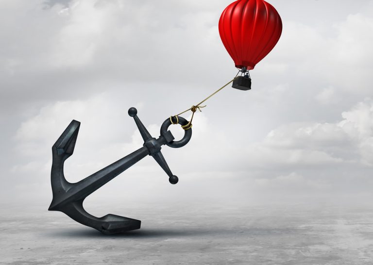legacy infrastructure - Resilience Forward A huge anchor holds back a hot air balloon.