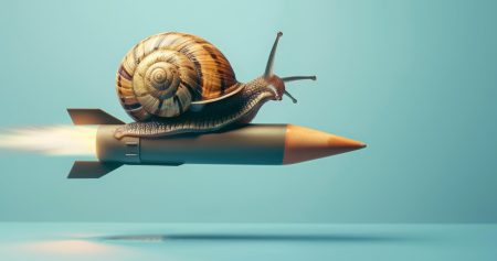 The need for speed: minimizing downtime after a cyberattack A snail riding a missile as a speed up concept.