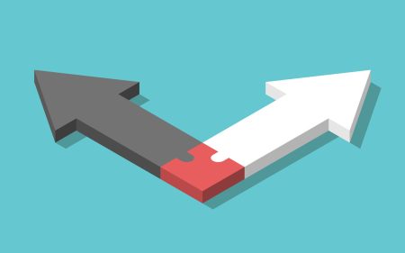 Two arrows diverge from a central point.
