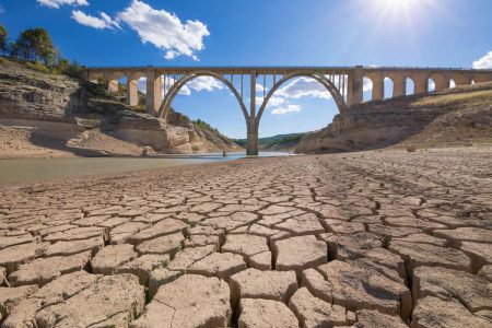 Water security risks increase in a third of countries Landscape of dry earth ground and viaduct, extreme drought in Entrepenas reservoir, in Guadalajara, Castilla, Spain Europe