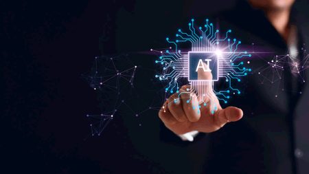 Five ways that enterprise risk management teams can leverage GenAI Artificial intelligence concept - a hand pushes a chip-based button to launch AI