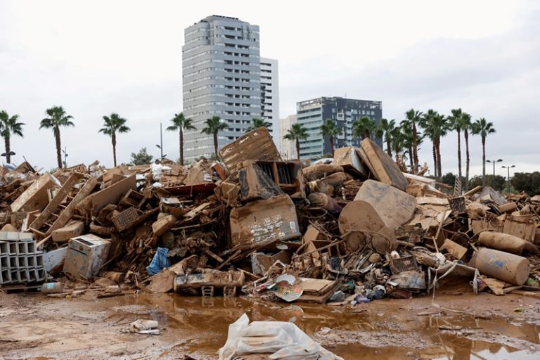 Disaster aftermath - Resilience Forward Large Pile of Debris from a Building Collapse during a Flood.