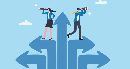 Taking a long-term view: chronic risks, business continuity, and resilience A female and a male professional look through binoculars and a telescope.