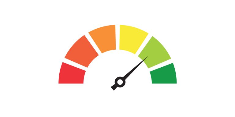 Performance level gauge meter with needle pointing to green zone, showing progress.