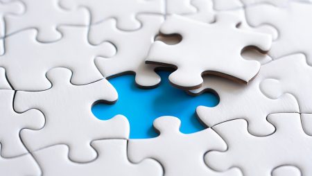 Almost Complete Jigsaw Puzzle with One Missing Piece.