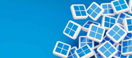 A large pile of tiles showing the Windows logo on a blue background.