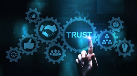 A group of business related icons with the word Trust in the centre