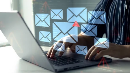 Spam email message on digital screen.
