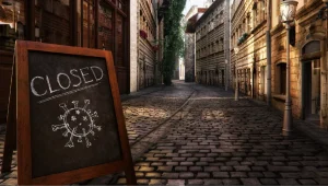 CLOSED message board near a bar on an empty street.