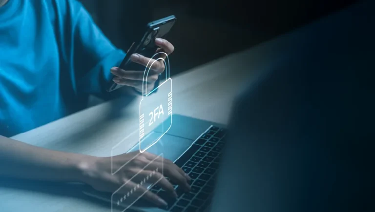 Multi-factor authentication concept with smartphone and laptop showing secure login, identity verification, OTP code, and two-factor protection.