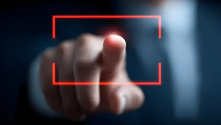 A finger pressing a screen to start a recovery.