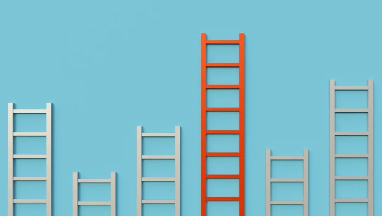 Multiple white ladders with varying heights against orange background - shows the concept of multiple capabilities.