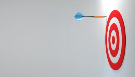 A dart thrown at a target misses the target.